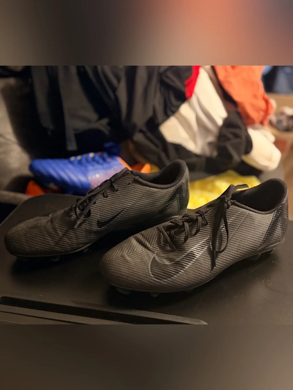 Nike Men’s Black Soccer Cleats with Subtle Blue Swoosh